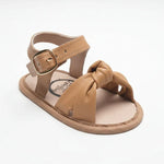 Little Love Bug Co. The Hazel leather baby moccasins in tan.