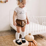 Little Love Bug Co. The Olivia organic blush pink leather baby moccasins.