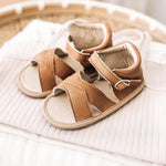 Baby and toddler sandal with adjustable buckle and elastic entrance