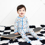 Baby footie pajamas with thunderbolt print and two-way front zipper, covered feet
