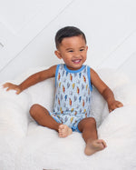 Sleeveless baby shortall in Thunderbolt print with snap closures at the shoulders and legs