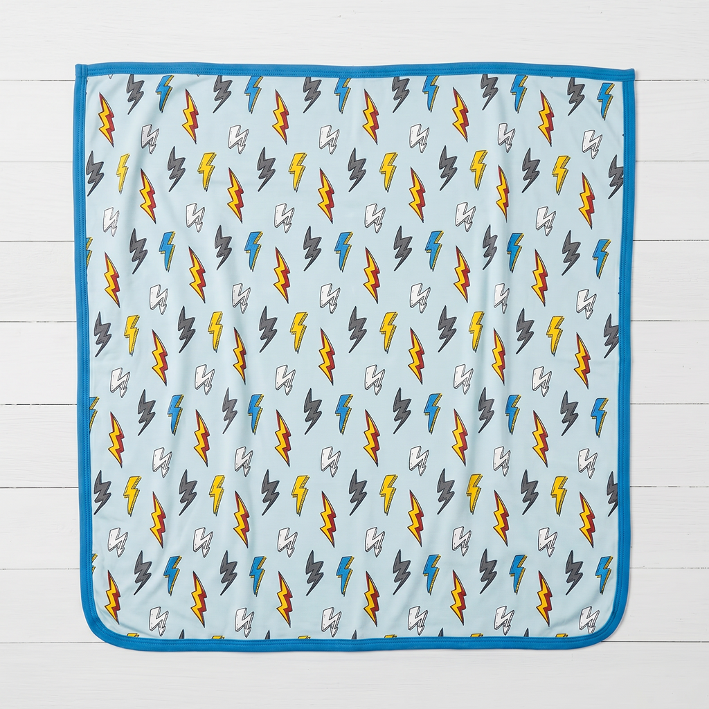 Swaddle blanket with thunderbolt print, 45 by 45 inches, shown spread flat
