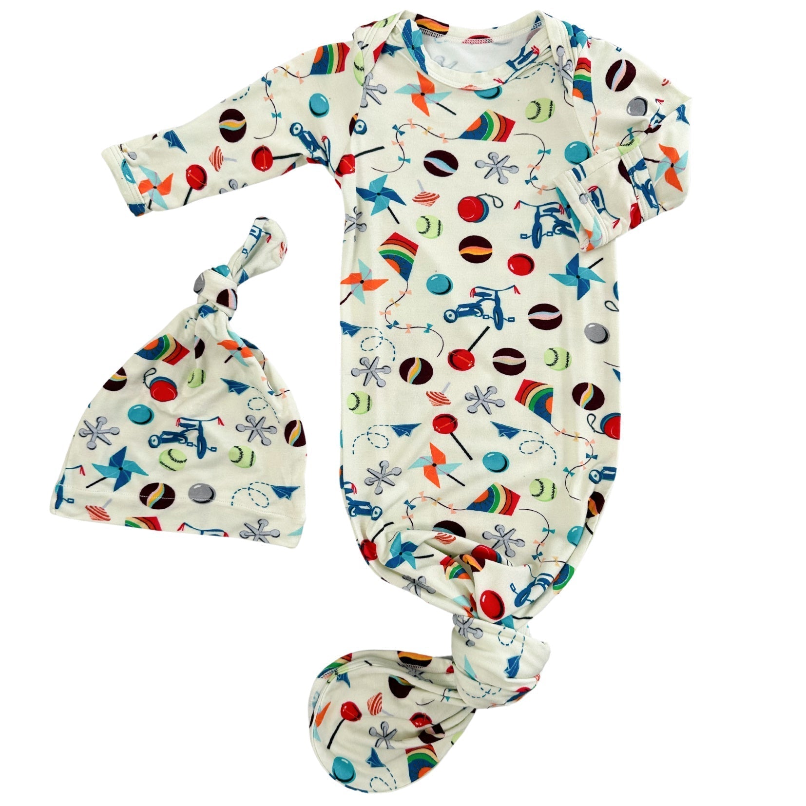 Baby gown with fold-over mittens and matching hat in the Timeless Toys print.