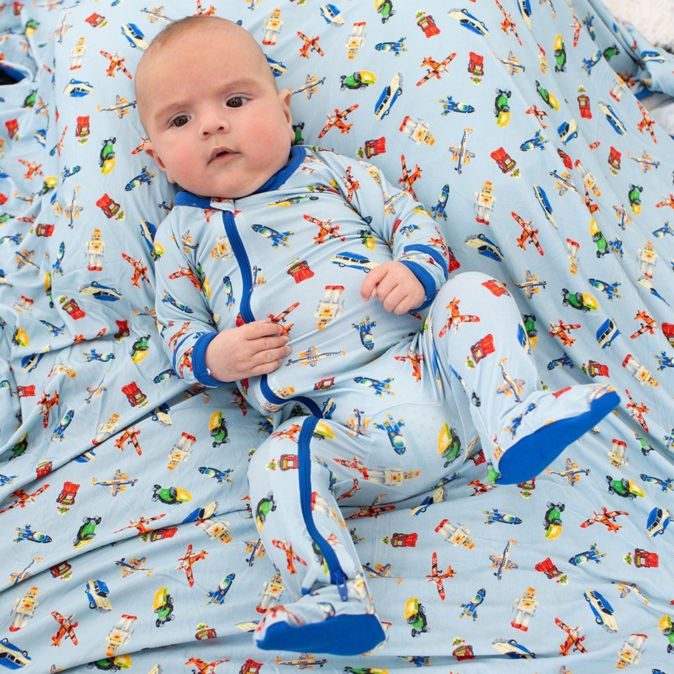 Baby footie pajamas with full-length front zipper and covered feet.