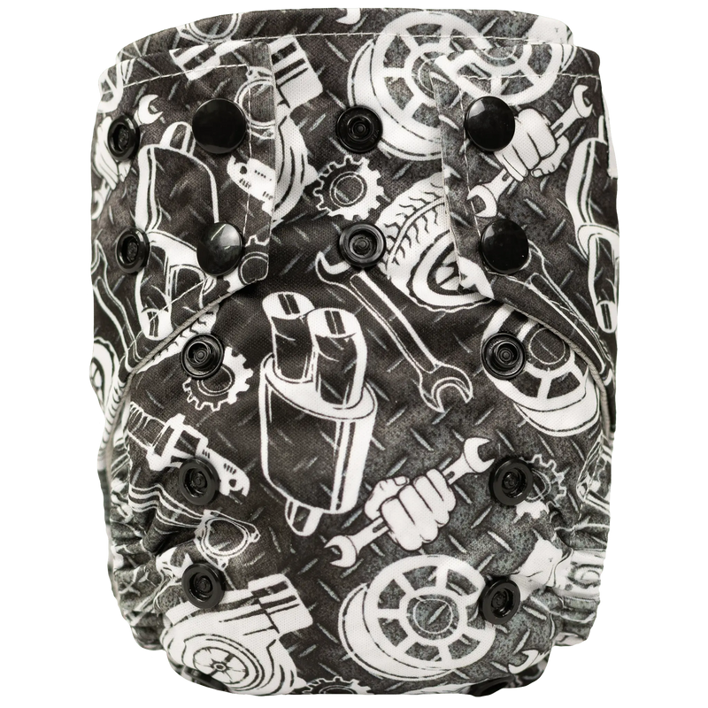 Tiny Tushies Newborn AIO Cloth Diaper with automotive print and snaps.