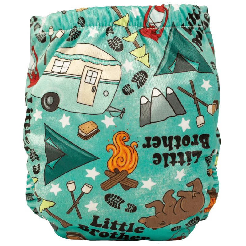 Tiny Tushies Newborn AIO Cloth Diaper with fun outdoor-themed print, featuring secure snaps and moisture-wicking material.