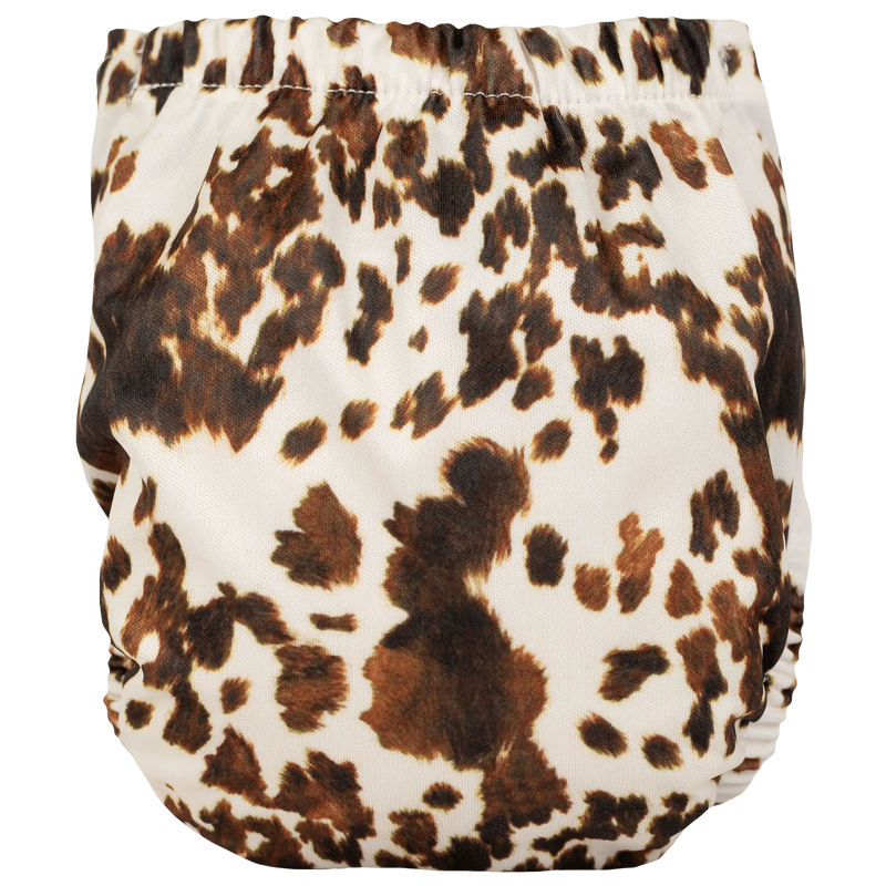 Tiny Tushies Newborn AIO Cloth Diaper with leopard print.