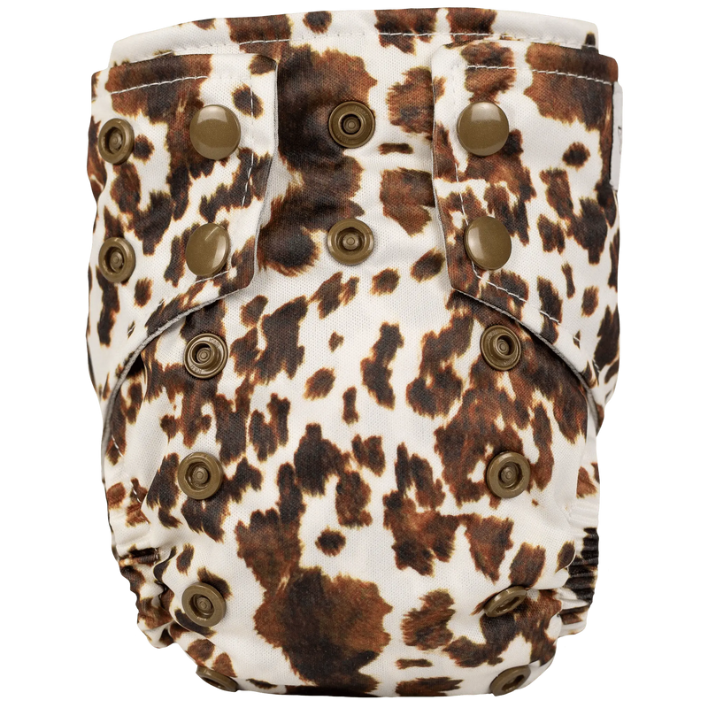 Tiny Tushies Newborn AIO Cloth Diaper with animal print design and multi-size snaps.