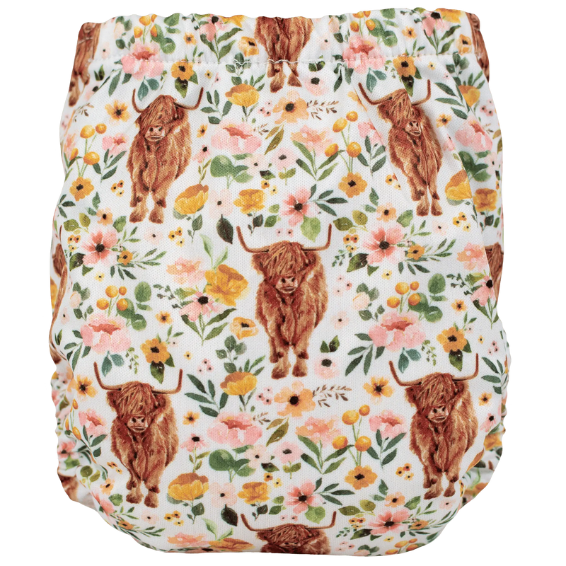 Tiny Tushies Newborn AIO Cloth Diaper with animal and floral print, adjustable fit for babies 5-20 lbs.