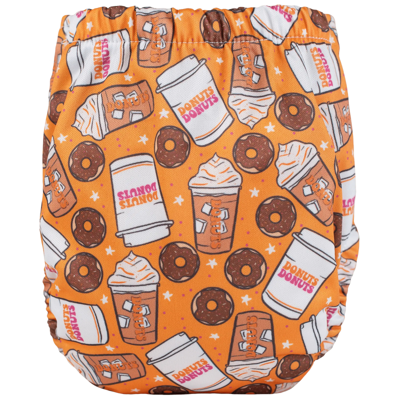 Tiny Tushies Newborn AIO cloth diaper with donut print pattern.