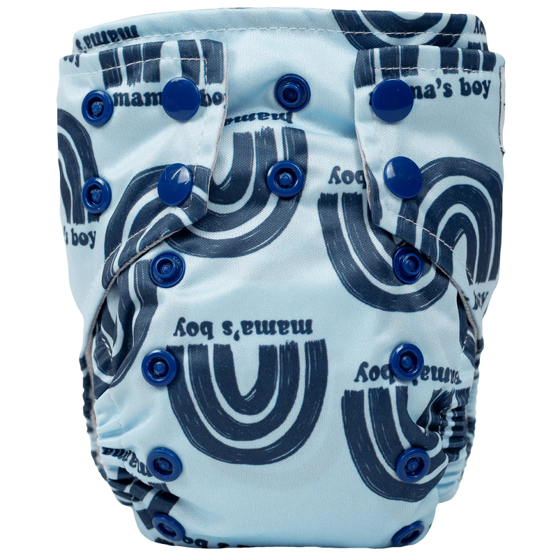 Tiny Tushies Newborn AIO Cloth Diaper with blue buttons and graphic design.
