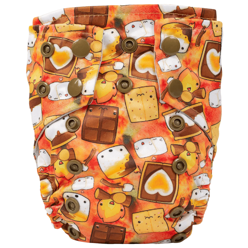 Tiny Tushies Newborn AIO Cloth Diaper with snaps and colorful print for babies 5-20 lbs.