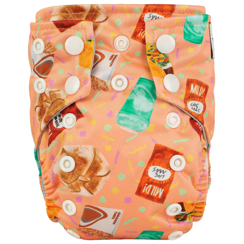 Tiny Tushies Newborn AIO Cloth Diaper with colorful printed design.