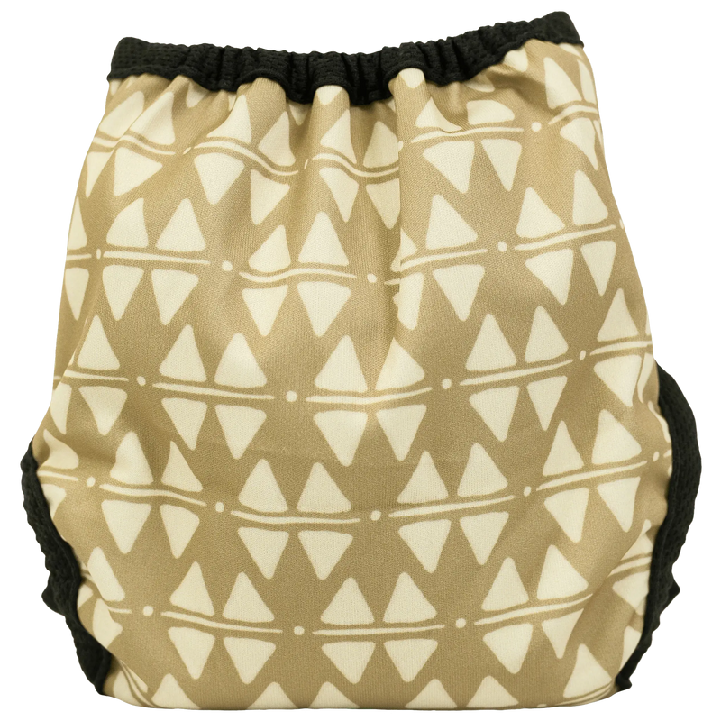 Tiny Tushies Newborn Hook & Loop Cloth Diaper Cover with geometric pattern.