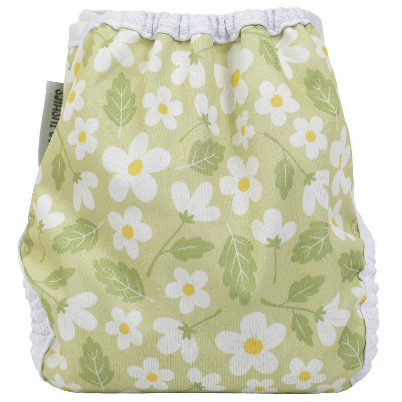 Tiny Tushies Newborn Cover with floral pattern, adjustable hook & loop, suitable for 5-20 lbs babies.