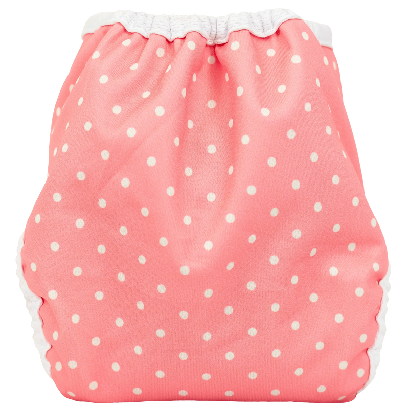 Tiny Tushies Newborn Hook & Loop Cover in pink polka dots, adjustable for 5-20 lbs, with umbilical cord snap down.