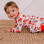 Baby coverall in a green frog-themed print with cuffed ankles and a front two-way zipper