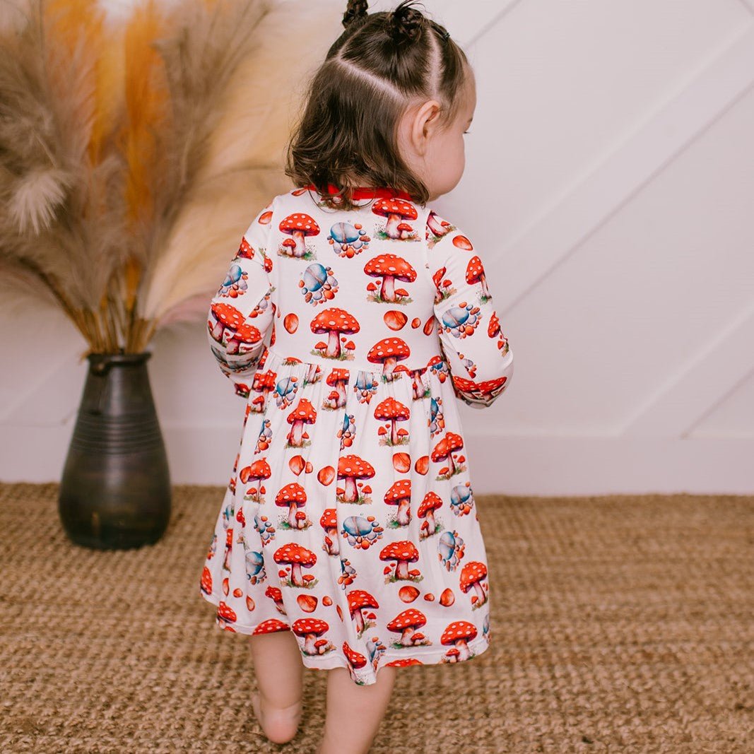 Long sleeve twirl dress with a whimsical toadstool print in pink and red