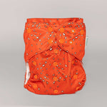 Abstract: Essentials Pocket Cloth Diaper with Athletic Wicking Jersey, Grows with your Baby - Everetts Place Boutique - Pocket Diaper