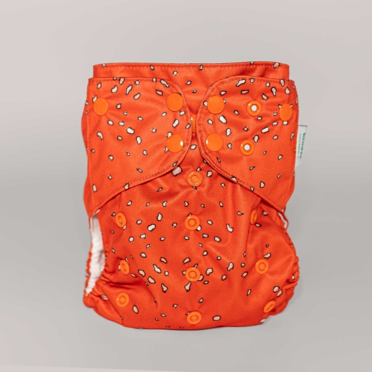 Abstract: Essentials Pocket Cloth Diaper with Athletic Wicking Jersey, Grows with your Baby - Everetts Place Boutique - Pocket Diaper