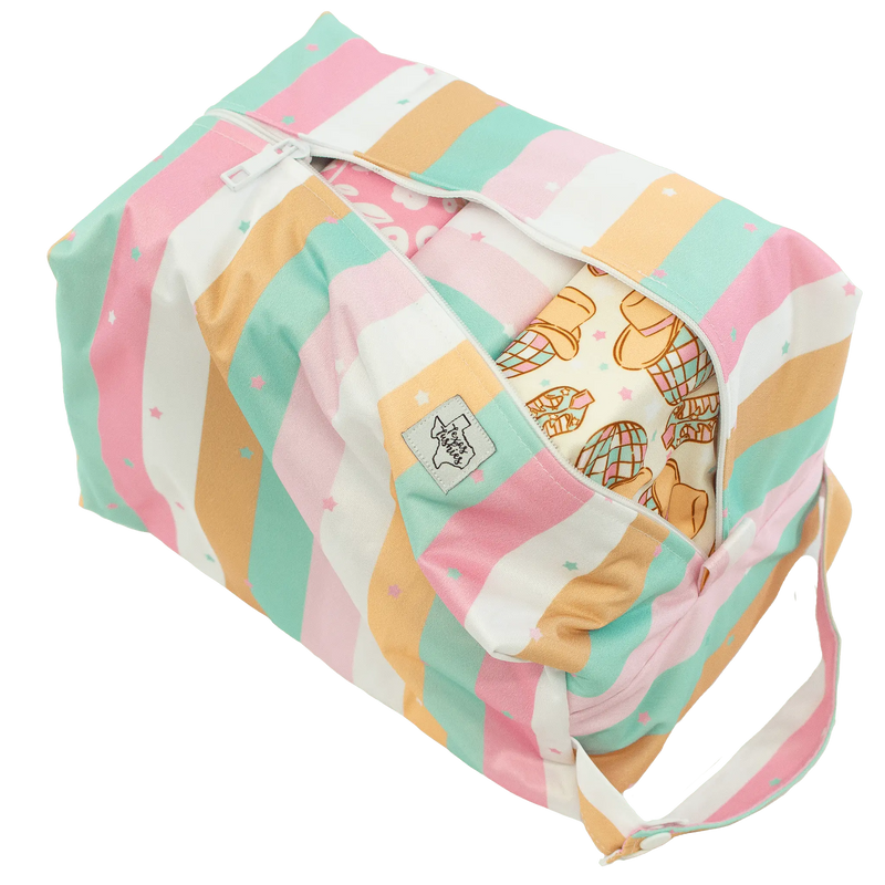 Triple Treat - Pod with colorful striped design and snap handle.