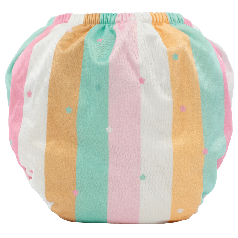 Triple Treat training pants with colorful stripes and star pattern, featuring bamboo layers and leak-proof lining.