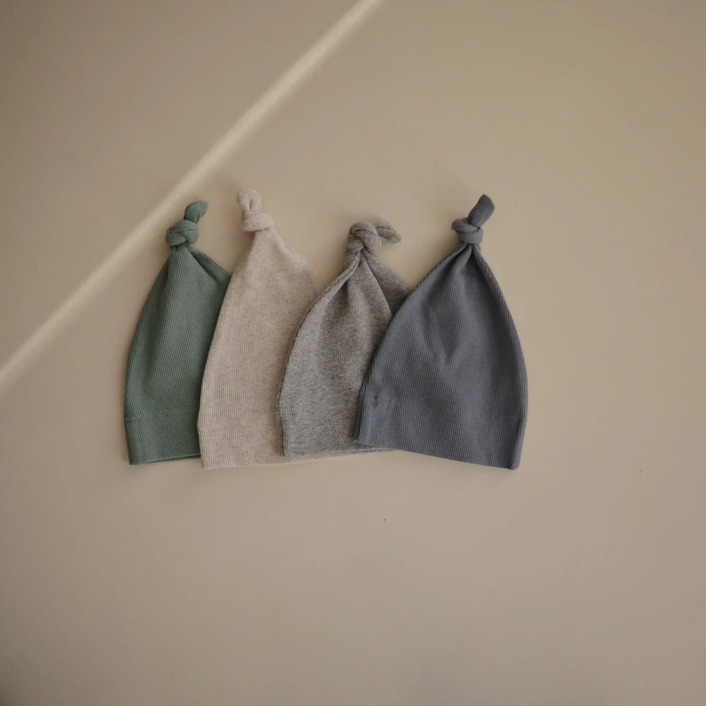 Ribbed Organic Cotton Baby Beanie for Newborns 0-3 Months with Top Knot Design Mushie