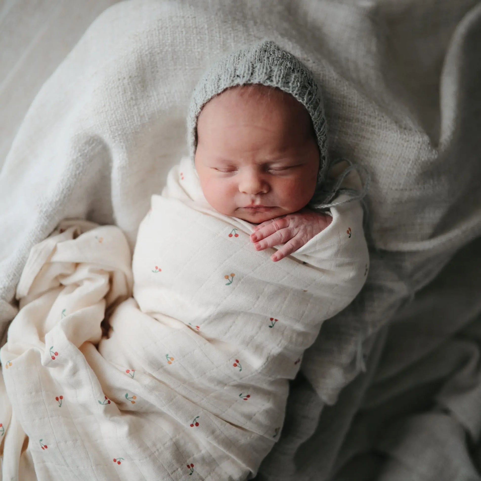 Organic Cotton Muslin Swaddle Blanket for Baby Cuddling and Nursing Mushie