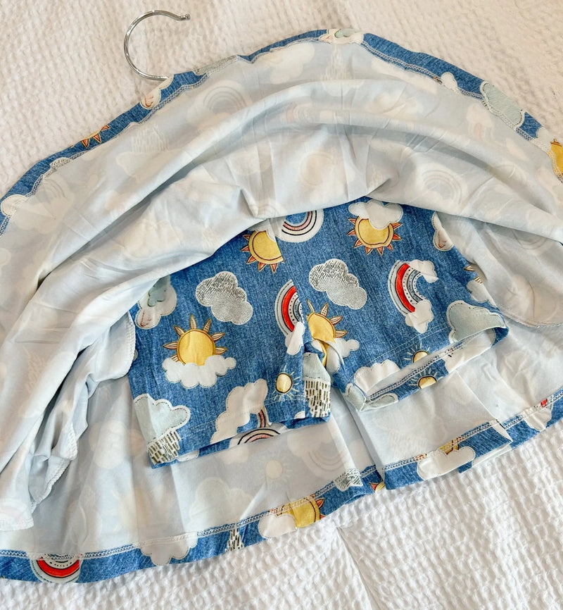 Soft, stretchy Twirl Skorts with a colorful celestial pattern; combines style of a skirt with the practicality of shorts.