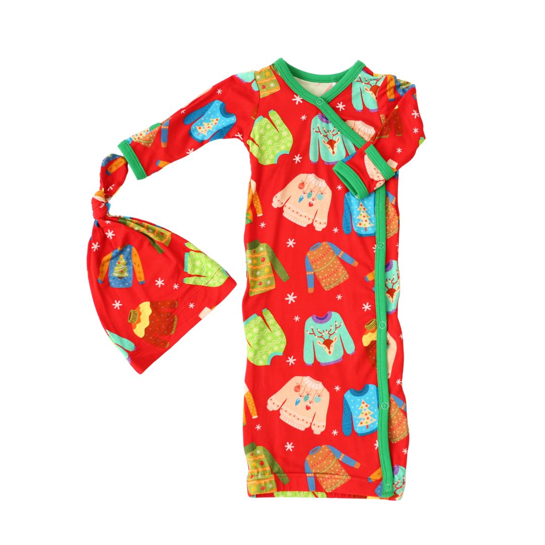 Baby gown with ugly sweater print in red and matching hat, kimono-style with fold-over cuffs