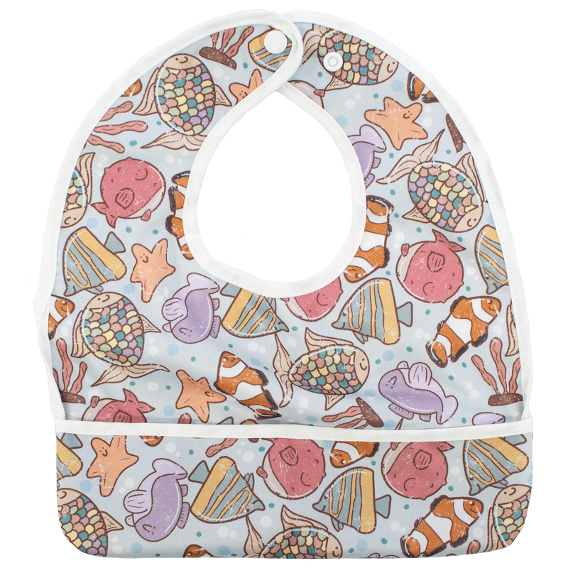 Under Waves - The Flip Bib with ocean-themed design, featuring food-catching pocket.
