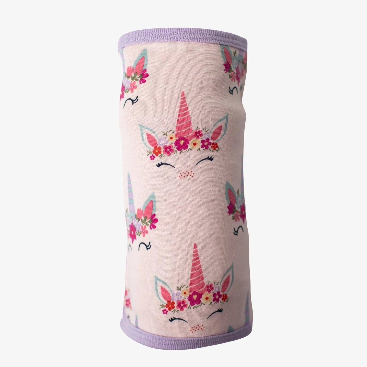 Swaddle blanket with a pink unicorn and party hat pattern spread flat
