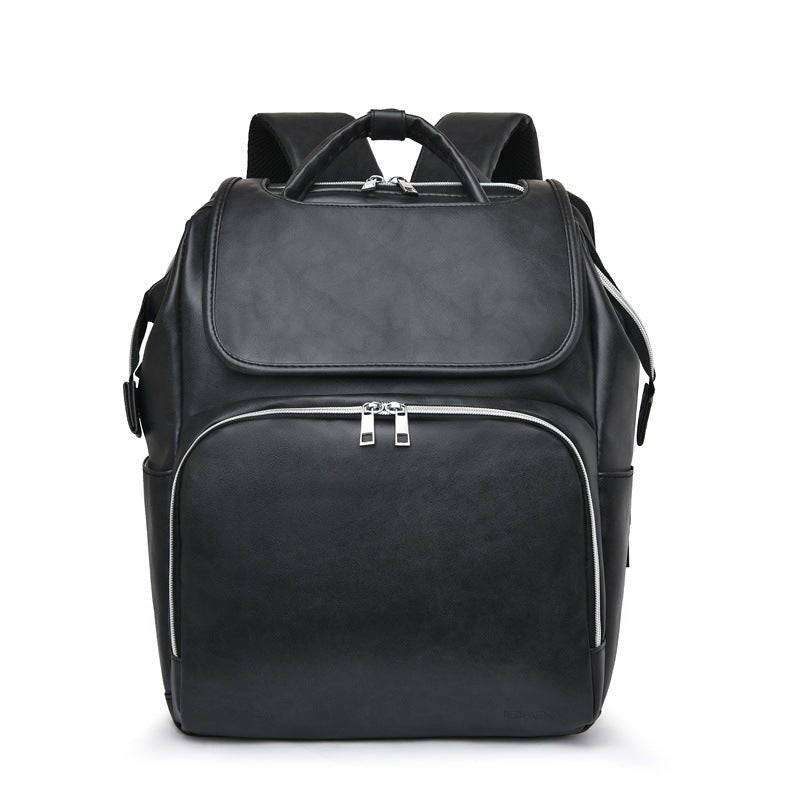 Unique backpack diaper bag in PU leather with multiple pockets and anti-theft features, ideal for parents.