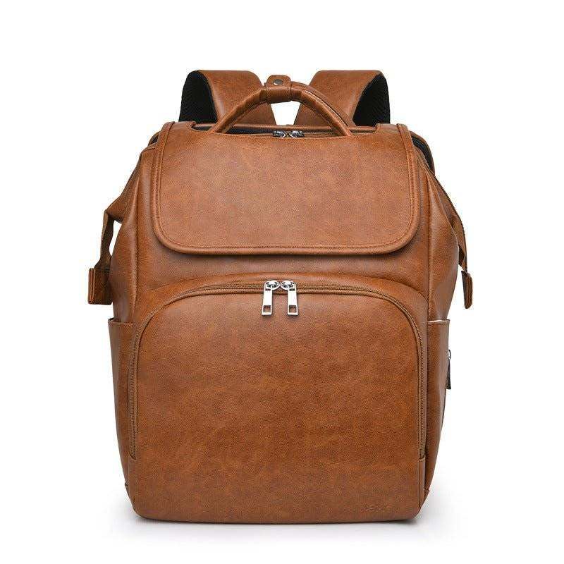 Unique backpack diaper bag in brown PU leather with multiple pockets and anti-theft features.