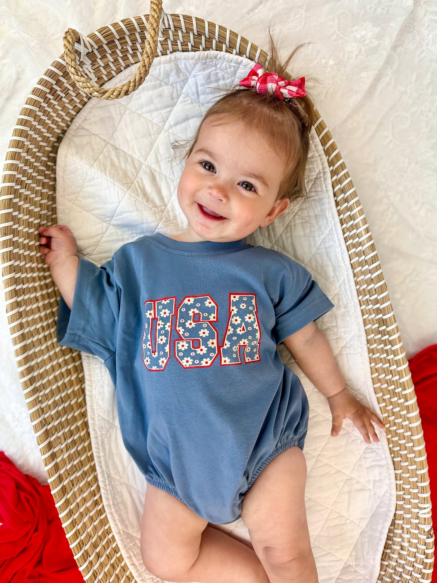 Little Joy Co. baby t-shirt romper in a soft cotton blend, perfect for comfortable play.