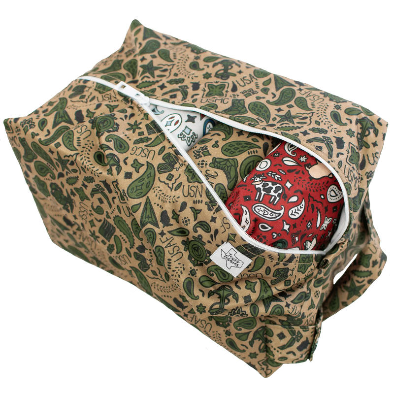 USA - Pod diaper storage bag with printed exterior and solid white interior, featuring a zipper closure and snap handle.