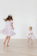 Mila & Rose ® Vintage Flags Smocked Ruffle Dress - 