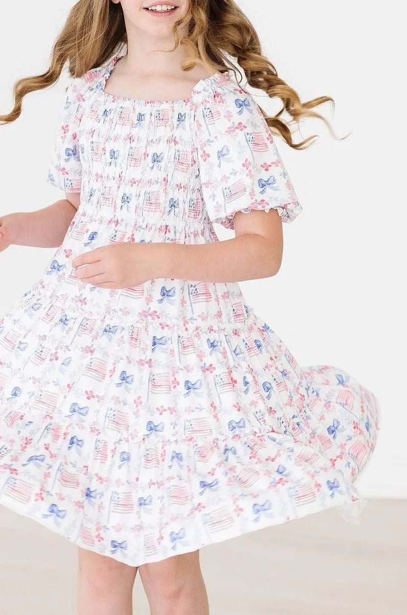 Mila & Rose ® Vintage Flags Smocked Ruffle Dress - 