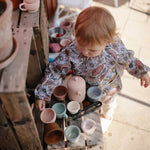 Mushie Water Resistant Long Sleeve Bib for Kids with Wide Pocket and Velcro Closure - Everetts Place Boutique - 