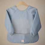 Mushie Water Resistant Long Sleeve Bib for Kids with Wide Pocket and Velcro Closure - Everetts Place Boutique - 