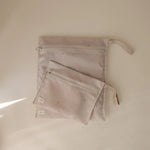 Mushie Water Resistant Wet Bag for Swimsuits and Dirty Clothes with Zipper Closure and Machine Washable Material -