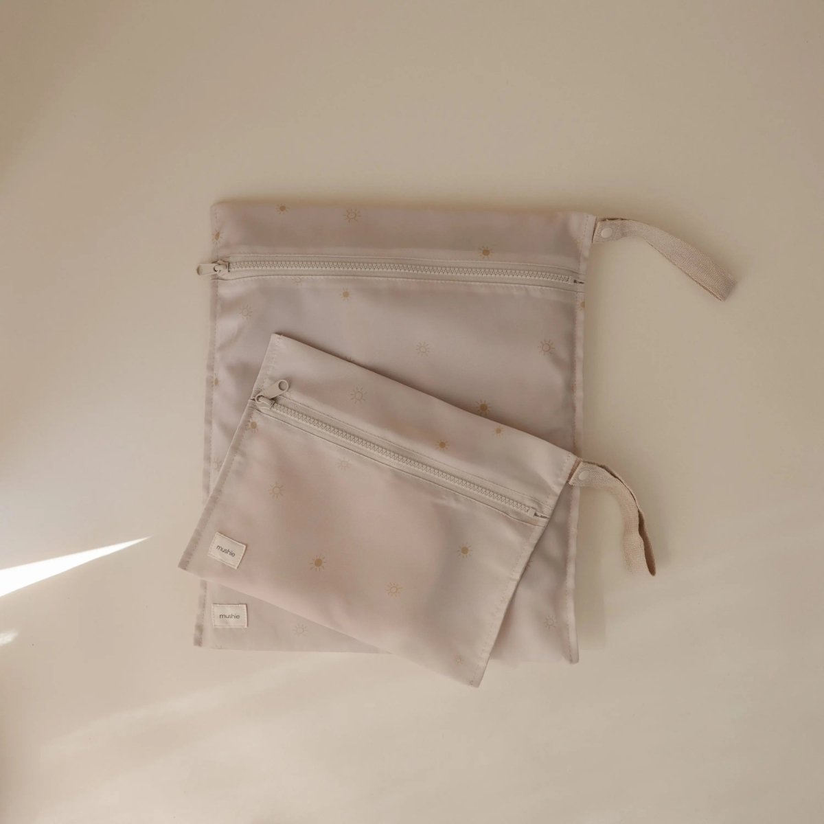 Mushie Water Resistant Wet Bag for Swimsuits and Dirty Clothes with Zipper Closure and Machine Washable Material -