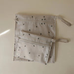 Mushie Water Resistant Wet Bag for Swimsuits and Dirty Clothes with Zipper Closure and Machine Washable Material -