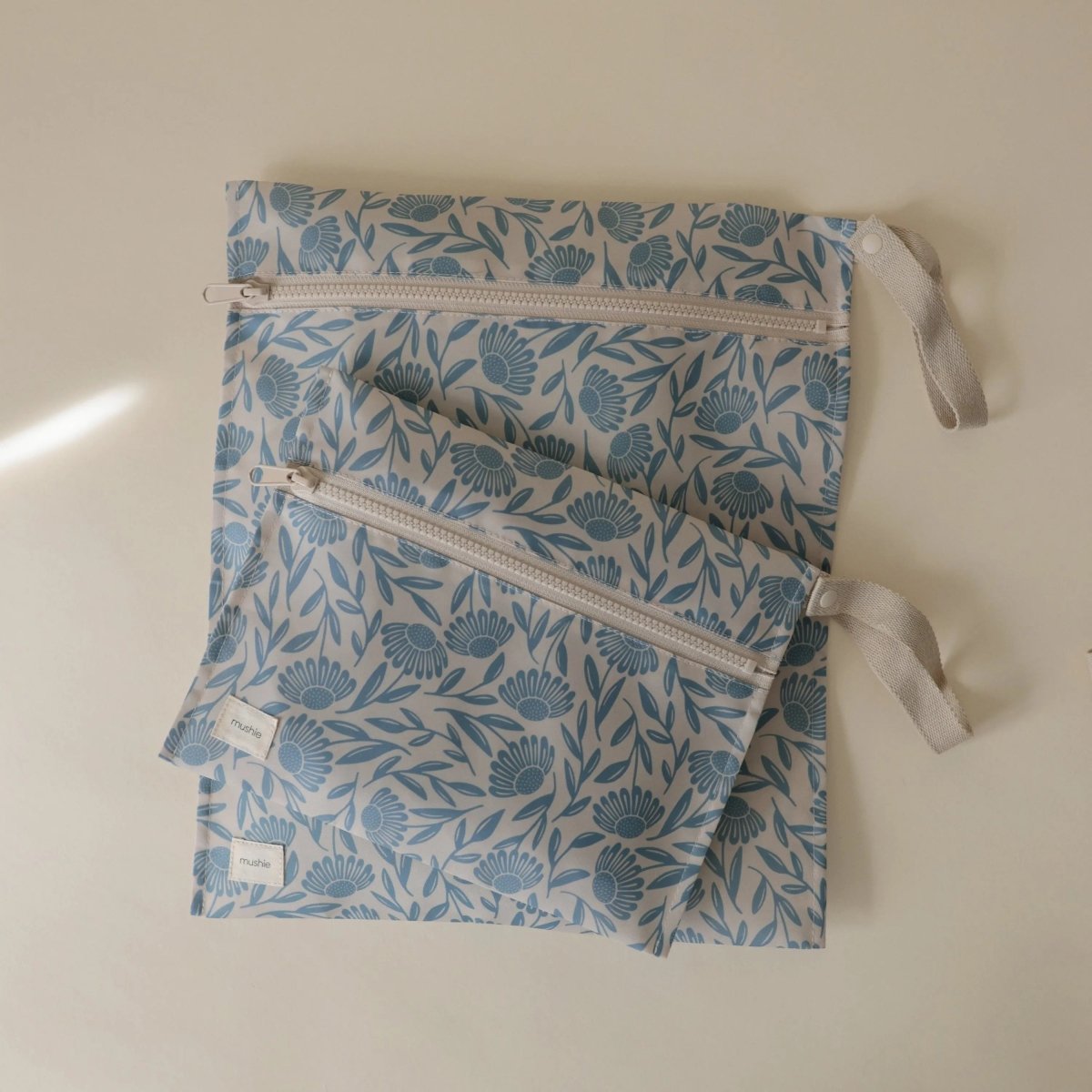 Mushie Water Resistant Wet Bag for Swimsuits and Dirty Clothes with Zipper Closure and Machine Washable Material -