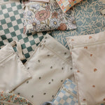 Mushie Water Resistant Wet Bag for Swimsuits and Dirty Clothes with Zipper Closure and Machine Washable Material -