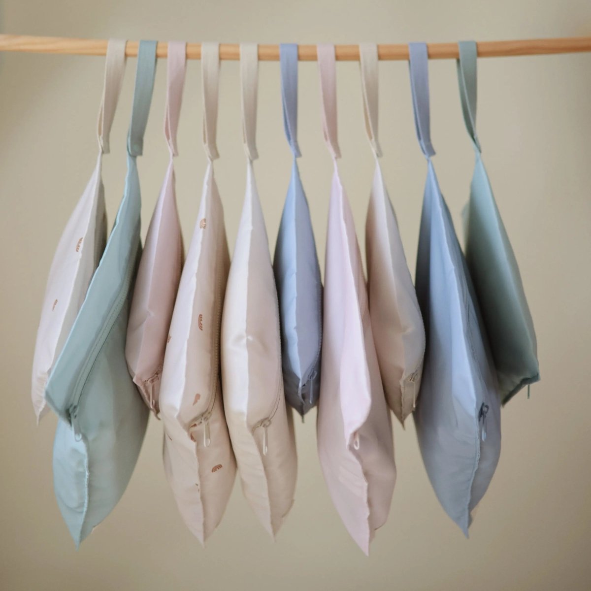 Mushie Water Resistant Wet Bag for Swimsuits and Dirty Clothes with Zipper Closure and Machine Washable Material -