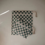 Mushie Water Resistant Wet Bag for Swimsuits and Dirty Clothes with Zipper Closure and Machine Washable Material -