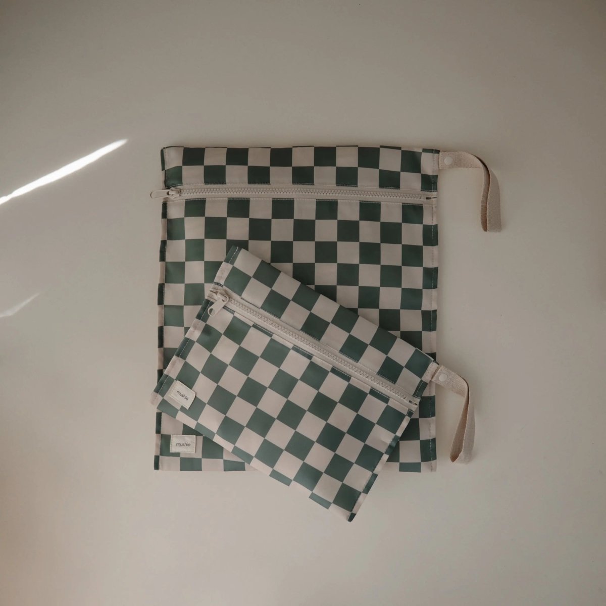 Mushie Water Resistant Wet Bag for Swimsuits and Dirty Clothes with Zipper Closure and Machine Washable Material -