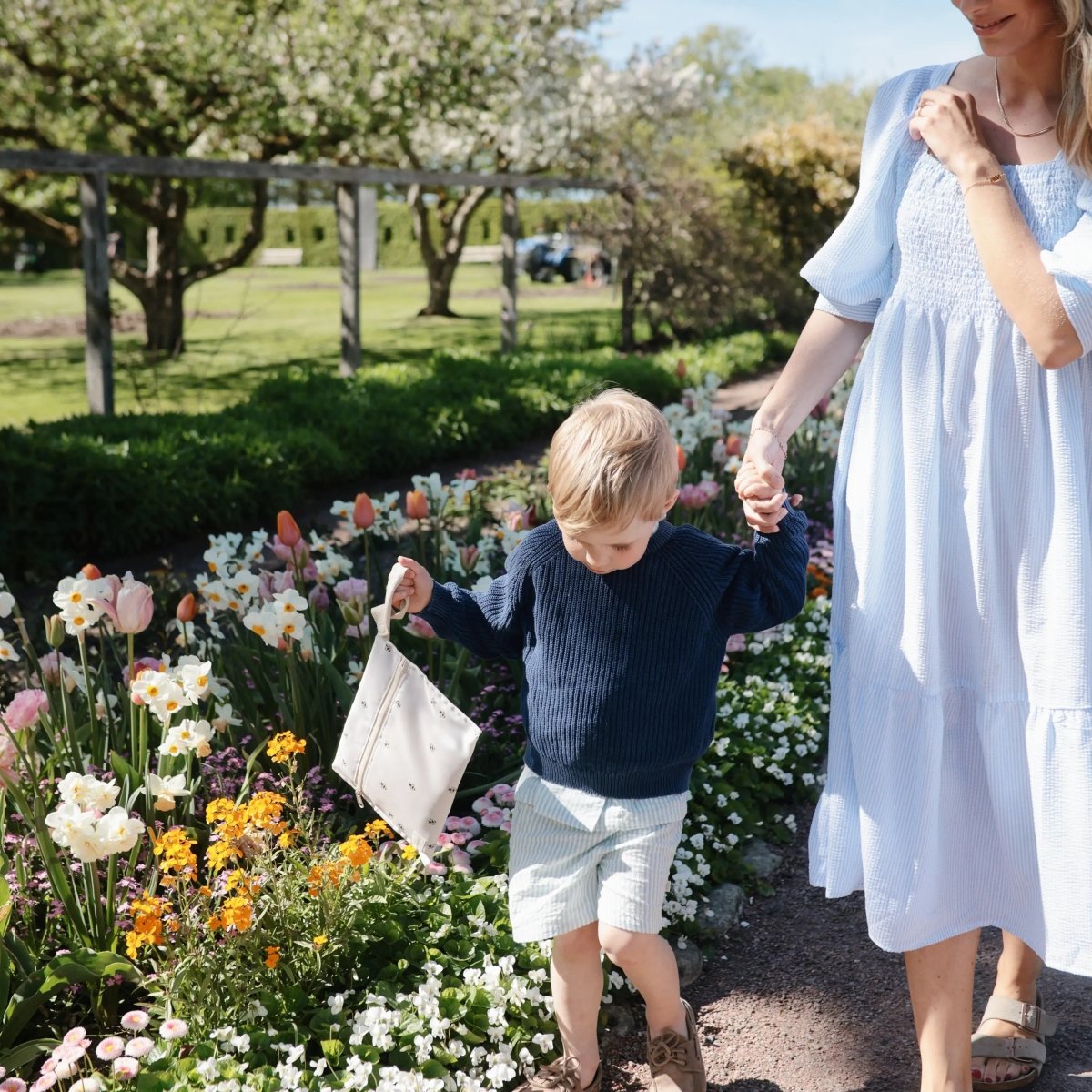 Mushie Water Resistant Wet Bag for Swimsuits and Dirty Clothes with Zipper Closure and Machine Washable Material -