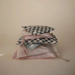 Mushie Water Resistant Wet Bag for Swimsuits and Dirty Clothes with Zipper Closure and Machine Washable Material -